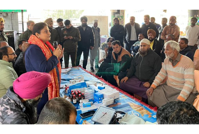 Former Minister, Priya Sethi addressing during a medical camp organised in Jammu on Friday.