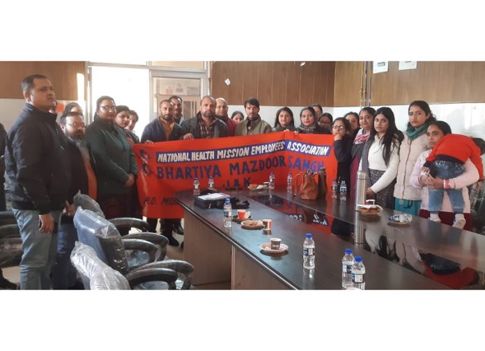 NHM employees posing together after a meeting at CHC Ramgarh in Samba district.