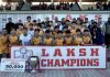 Winning team Realona FC Kargil, posing with the trophy alongside dignitaries during the prize distribution ceremony at Mini Stadium, Parade, Jammu on Wednesday.