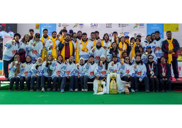 Winning team posing along with trophy during Khelo India Winter Games at Leh.