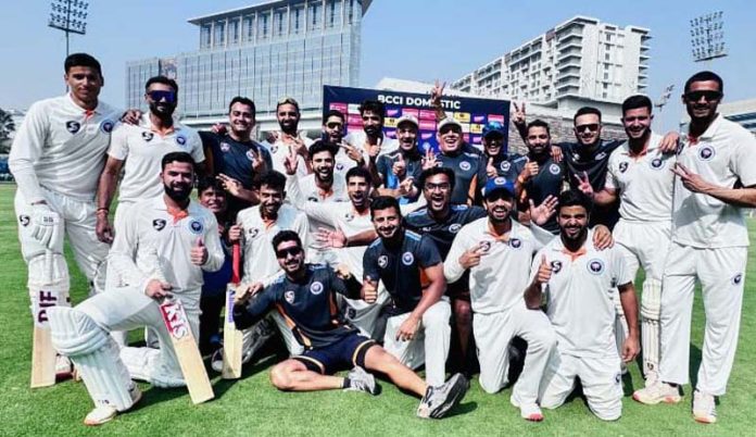 Victorious Jammu and Kashmir cricket team posing for a group photograph after their stunning 5-wicket victory over defending champions Mumbai in the Ranji Trophy match at Mumbai.