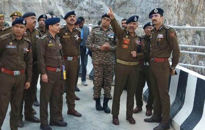 DGP Nalin Prabhat inspecting security arrangements around a bridge in Reasi district on Tuesday.