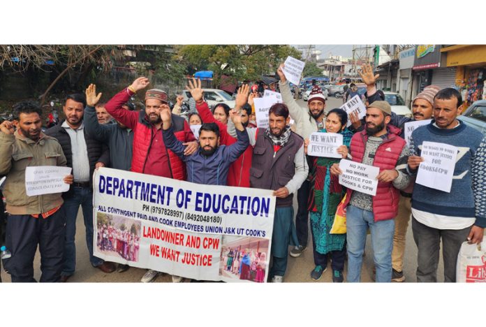 CP workers and cooks staging protest in Jammu. -Excelsior/Rakesh CP workers and cooks staging protest in Jammu. -Excelsior/Rakesh