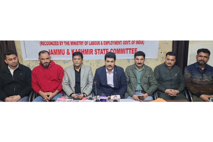 Senior Trade Union leader Ghulam Rasool Geelani addressing press conference in Jammu. -Excelsior/Rakesh