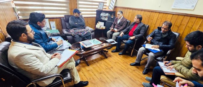 Minister Javed Rana chairing a meeting on Saturday.