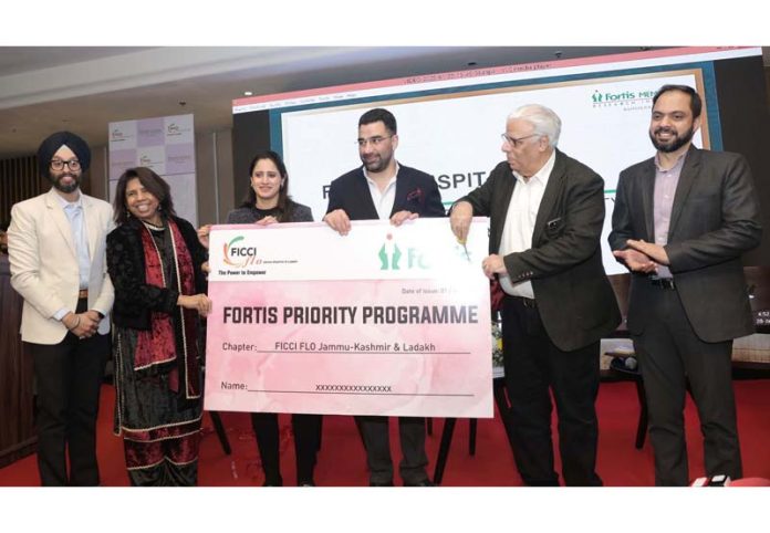Dr Syed Abid Rasheed Shah, Secy to Government, H&ME Deptt launching Fortis Privilege Card, during an event held in Jammu on Tuesday.