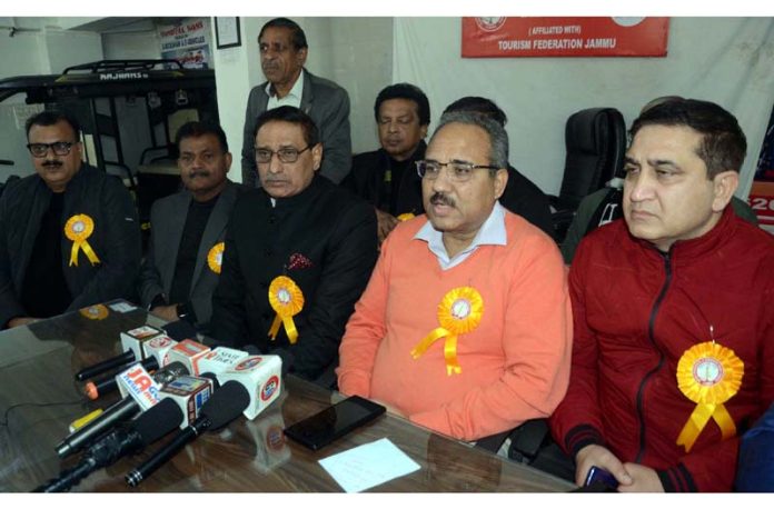 Rajesh Gupta talking to media persons at Jammu on Sunday. -Excelsior/Rakesh