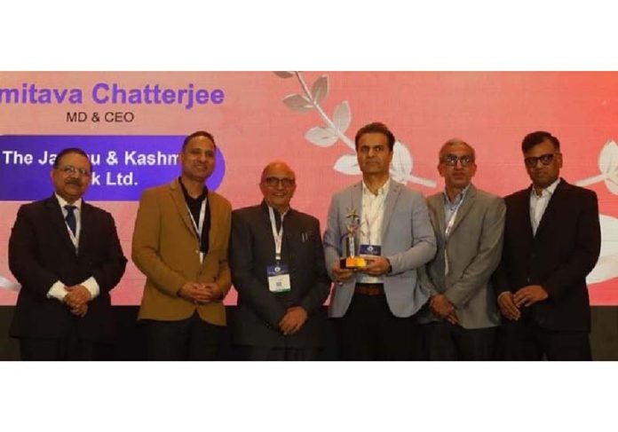 Dy Governor RBI presenting an award to J&K Bank's DGM Mohammad Muzafar Wani, during a function on Tuesday. Dy Governor RBI presenting an award to J&K Bank's DGM Mohammad Muzafar Wani, during a function on Tuesday.