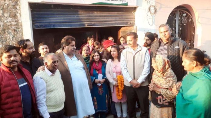Cong leader Raman Bhalla interacting with people in R S Pura.