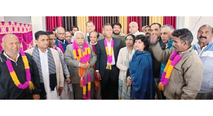 Senior NC leader Ajay Kumar Sadhotra with newly elected team of Numberdars and Chowkidars of Suchetgarh Assembly Constituency.