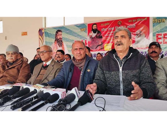 Chairman, Shri Guru Ravidas Trust C L Bansal, flanked by other members addressing press conference on Tuesday.