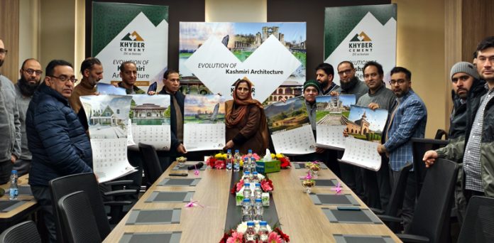 Hamida Akhter, GM District Industries Center unveiling calendar of Khyber Cement in Srinagar on Friday.