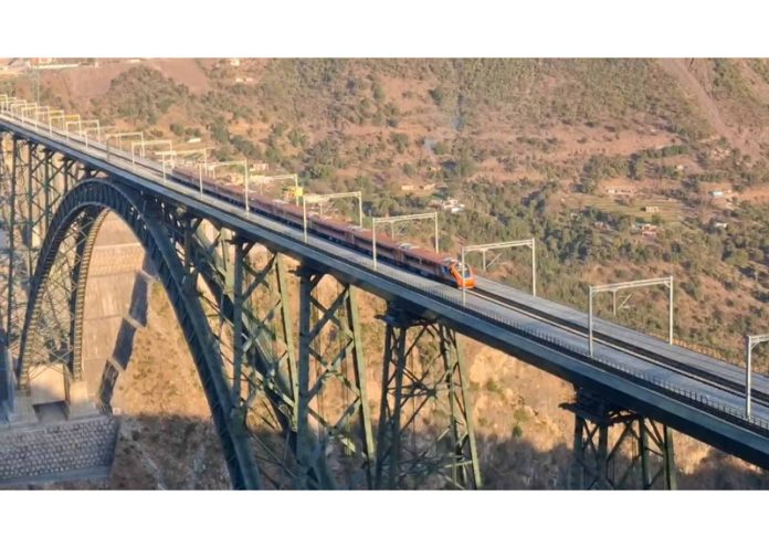 Vande Bharat train passing through World’s Highest Railway Bridge. - Excelsior/Romesh Mengi