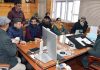 Minister Satish Sharma chairing a meeting at Civil Secretariat Srinagar on Friday.