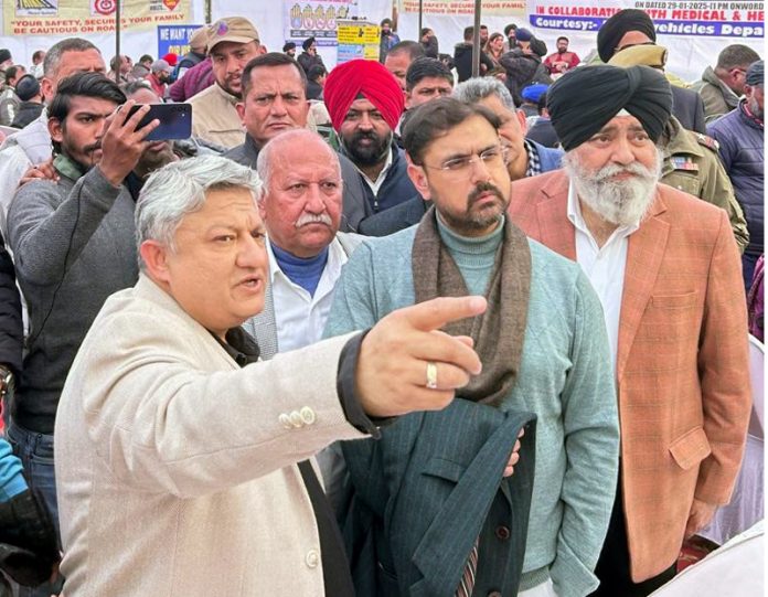 Minister Satish Sharma during medical camp at Railway Station.