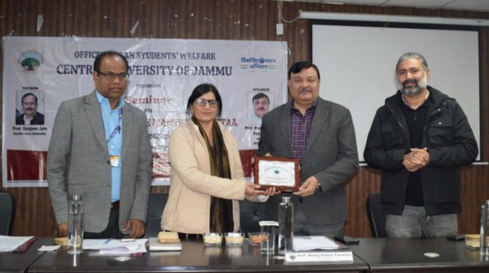Prof Ritu Bakshi presenting memento to key speaker Prof Manoj Kumar Patairiya during seminar at CUJ.