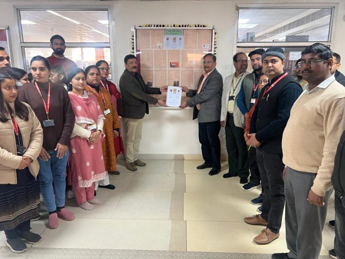 VC CUJ Prof Sanjeev Jain releasing new issue of the quarterly wall magazine 'Sharda' in presence of faculty and staff. VC CUJ Prof Sanjeev Jain releasing new issue of the quarterly wall magazine 'Sharda' in presence of faculty and staff.
