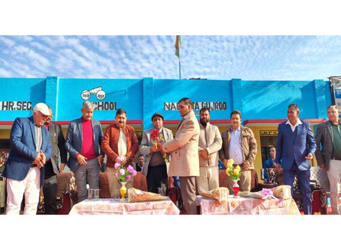 Principal Secretary, SED, Suresh Kumar Gupta felicitating the staff of GHSS, Nagrota Gujroo on Thursday.