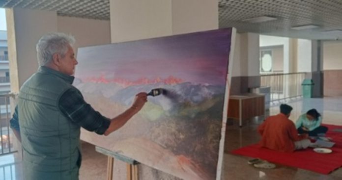 Acclaimed artist K.K Gandhi busy in his art work during a workshop at IIT Jammu. Acclaimed artist K.K Gandhi busy in his art work during a workshop at IIT Jammu.