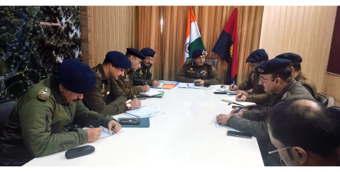DIG JSK Range chairing a meeting of police officers in Jammu on Thursday.