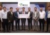 GM & Divisional Head (ROI) of J&K Bank, Rajesh Gupta along with other senior executives displaying a symbolic cheque of Rs 80 lakh.