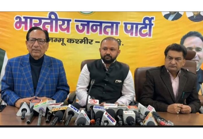Ankur Sharma addressing press conference at BJP headquarters in Jammu on Tuesday.