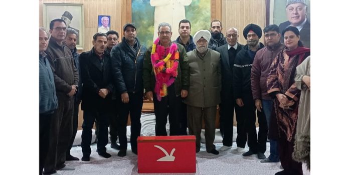NC Kashmir provincial president Advocate Showkat Ahmad Mir posing with minority wing leaders at Sher -e- Kashmir Bhawan, Jammu.
