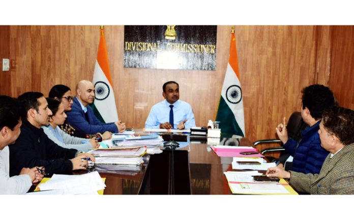 Div Com Jammu Ramesh Kumar chairing a meeting on Monday.