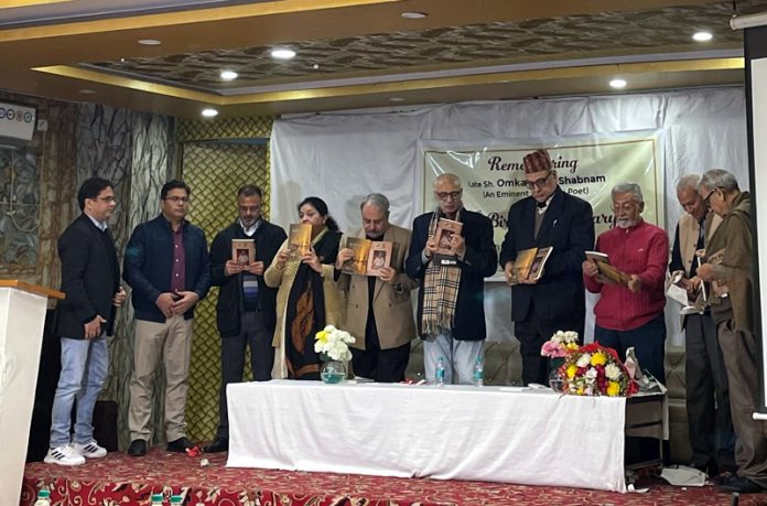 Members of Kashmiri Writers Group launching autobiography of Omkar Nath Shabnam during a function on Thursday.