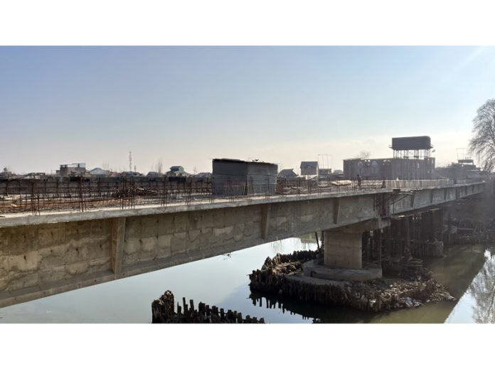 A view of under construction Qamarwari bridge in Srinagar. -Excelsior/Shahid Khazir