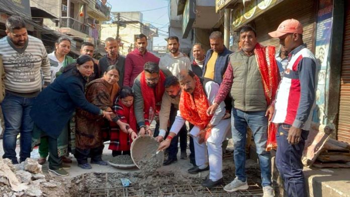 MLA Jammu West, Arvind Gupta starting work of installing new iron gratings at Shakti Nagar on Friday. MLA Jammu West, Arvind Gupta starting work of installing new iron gratings at Shakti Nagar on Friday.