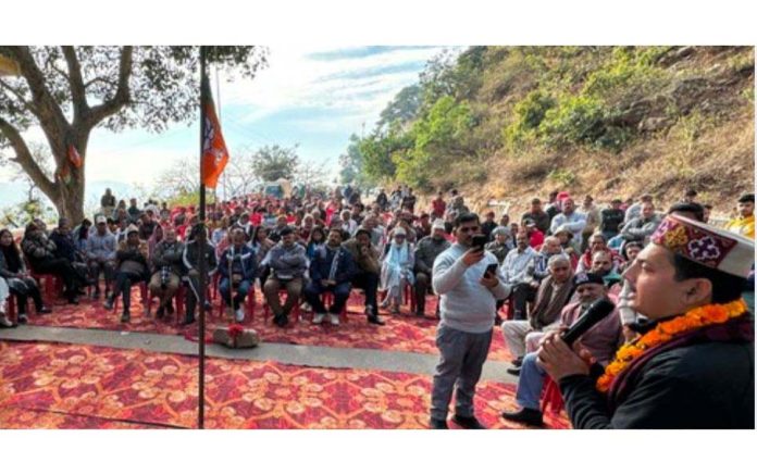 MLA R S Pathania addressing BJP workers and supporters at Battal Balian in Udhampur.