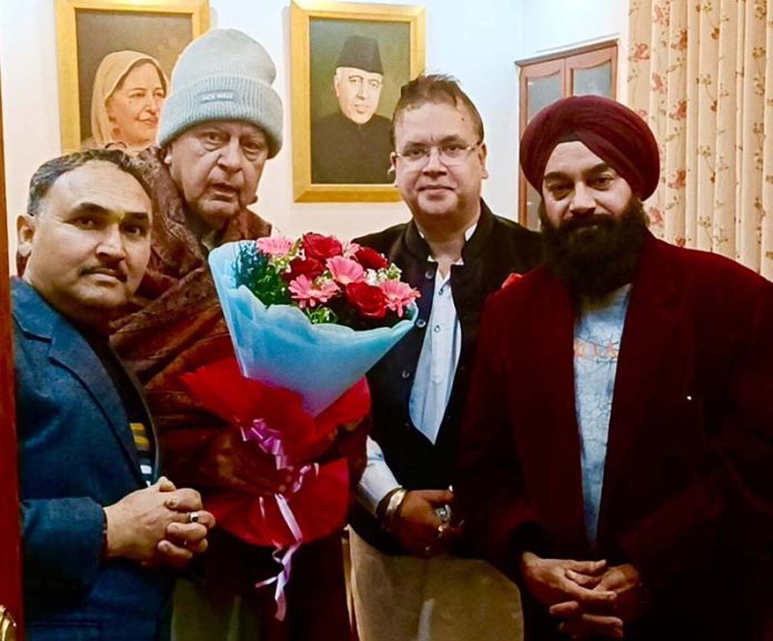 Delegation of J&K Feature Film Producers Directors Association meeting Dr Farooq Abdullah in Jammu on Monday.