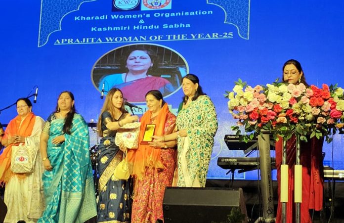 Prof Beena Budki, an esteemed educationist, receiving the award for 'Woman of the Year'.