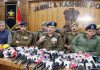 Senior Superintendent of Police, Jammu, Joginder Singh flanked by senior officers addressing a press conference on cracking the Jammu shoot-out case in Jammu on Wednesday.