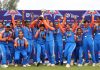 Indian Under-19 Women’s cricket team posing with World Cup trophy.