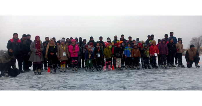 Athletes posing for group photograph during Khelo India Winter Games.