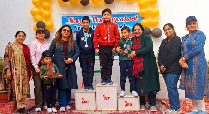 J&K fencers posing along with supporting staff. J&K fencers posing along with supporting staff.