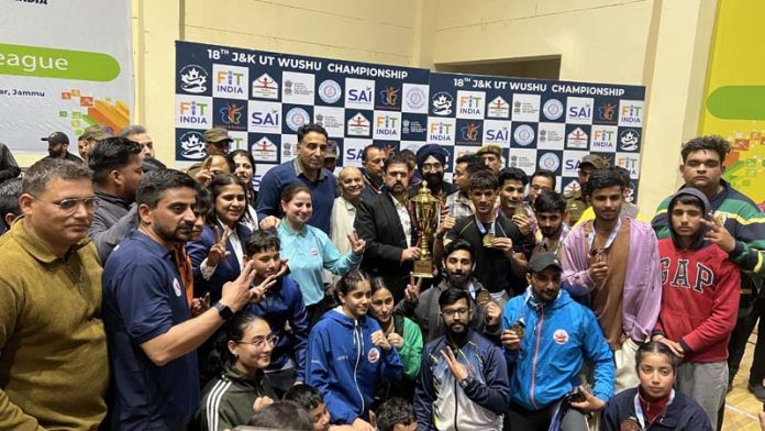 Sports Minister Satish Sharma presenting trophy to a winning team during closing ceremony in Jammu. Sports Minister Satish Sharma presenting trophy to a winning team during closing ceremony in Jammu.