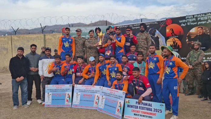 Dignitaries and winning team posing for a photograph along with trophy at Poonch. -Excelsior/Imran Dignitaries and winning team posing for a photograph along with trophy at Poonch. -Excelsior/Imran