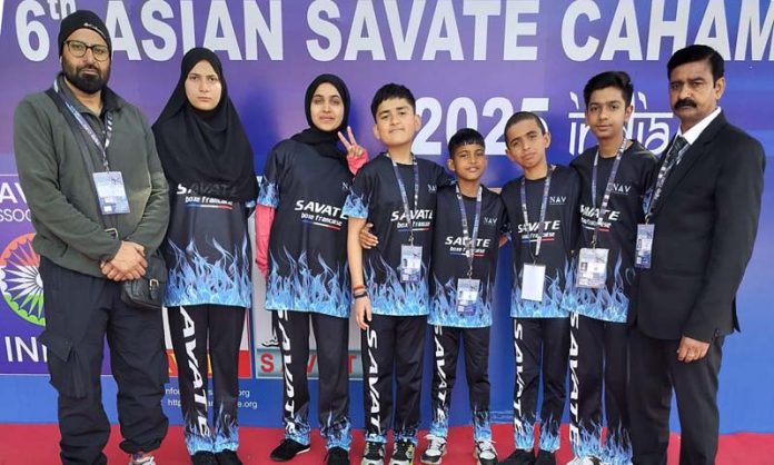 J&K players displaying their medals at the 6th Asian Savate (French Boxing) Championship 2025 held at Talkatora Stadium, Delhi. Snover Fayaz bagged the Bronze Medal, while Riffat Rasool secured Silver. The championship, featuring around 400 athletes from across Asia, was a major milestone for J&K's representation in the sports. The team was supported by Manoj Mehra, General Secretary of the Savate Association of J&K and President Aaftab, who congratulated the winners.