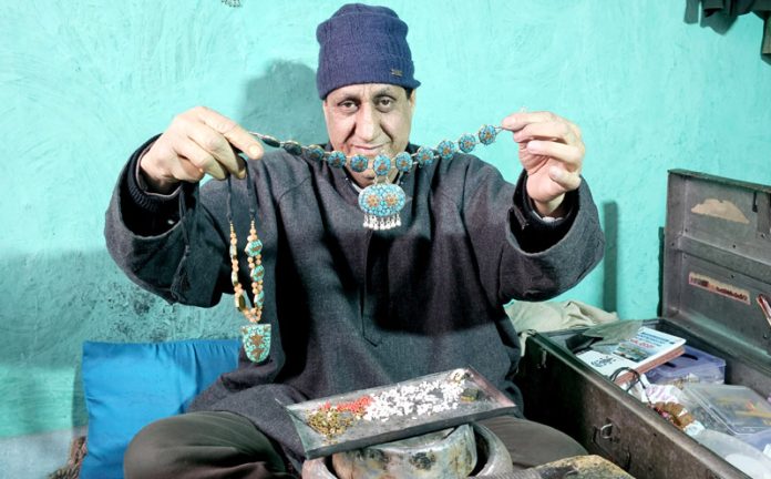 Kashmir’s last turquoise artisan. -Excelsior/Shakeel