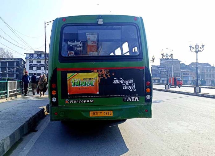 A Govt bus displaying tobacco advertisement in Srinagar.