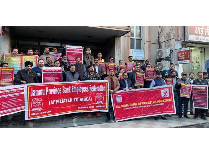 Bank employees staging protest in Jammu on Monday.