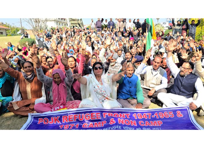 PoJK DPs staging protest demonstration at Maharaja Hari Singh Park in Jammu on Monday. -Excelsior/Rakesh