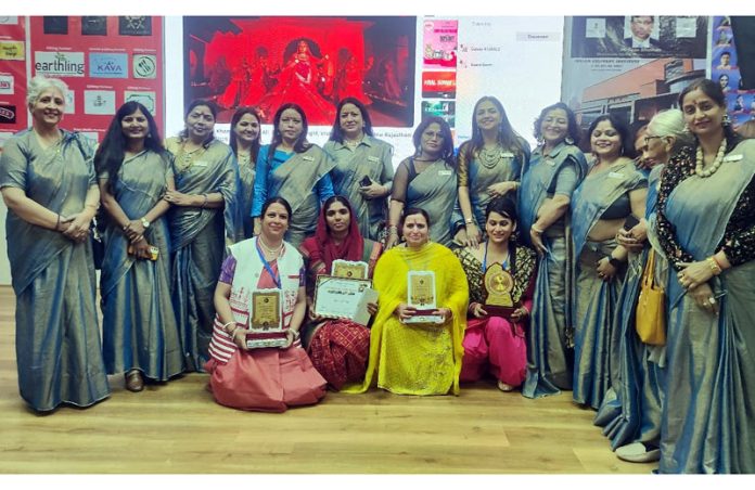 Winners of `Kahin Gum Na Ho Yayein' contest with jury and members of NGO posing for group photograph.