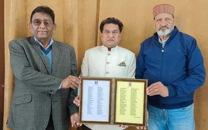 Balbir Ram Rattan along with others, releasing dogri poems on Guru Ravidass in Jammu on Wednesday.