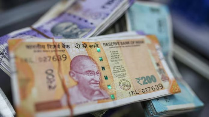 Rupee declines 4 paise to close at 86.72 against US dollar Rupee declines 4 paise to close at 86.72 against US dollar