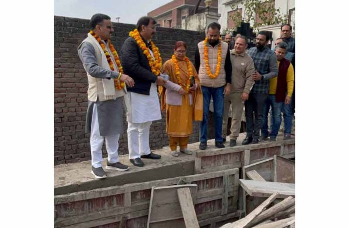 MLA Arvind Gupta inspecting repair works of Nallah at Poonch House in Jammu on Monday.