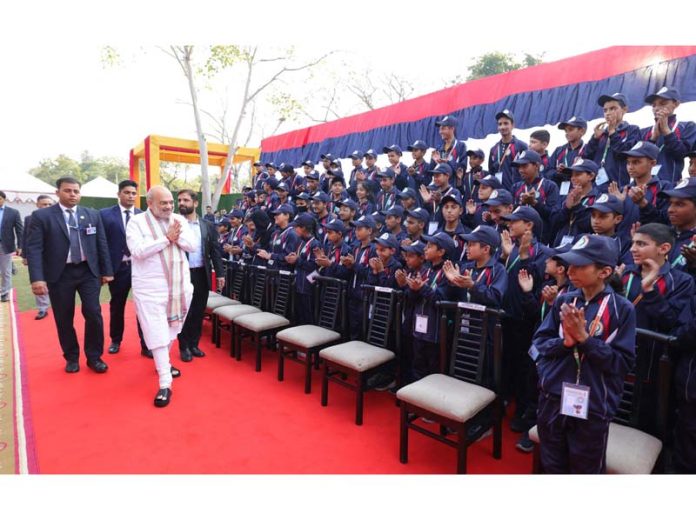 Home Minister Amit Shah with youngsters of J&K in New Delhi on Monday. Home Minister Amit Shah with youngsters of J&K in New Delhi on Monday.